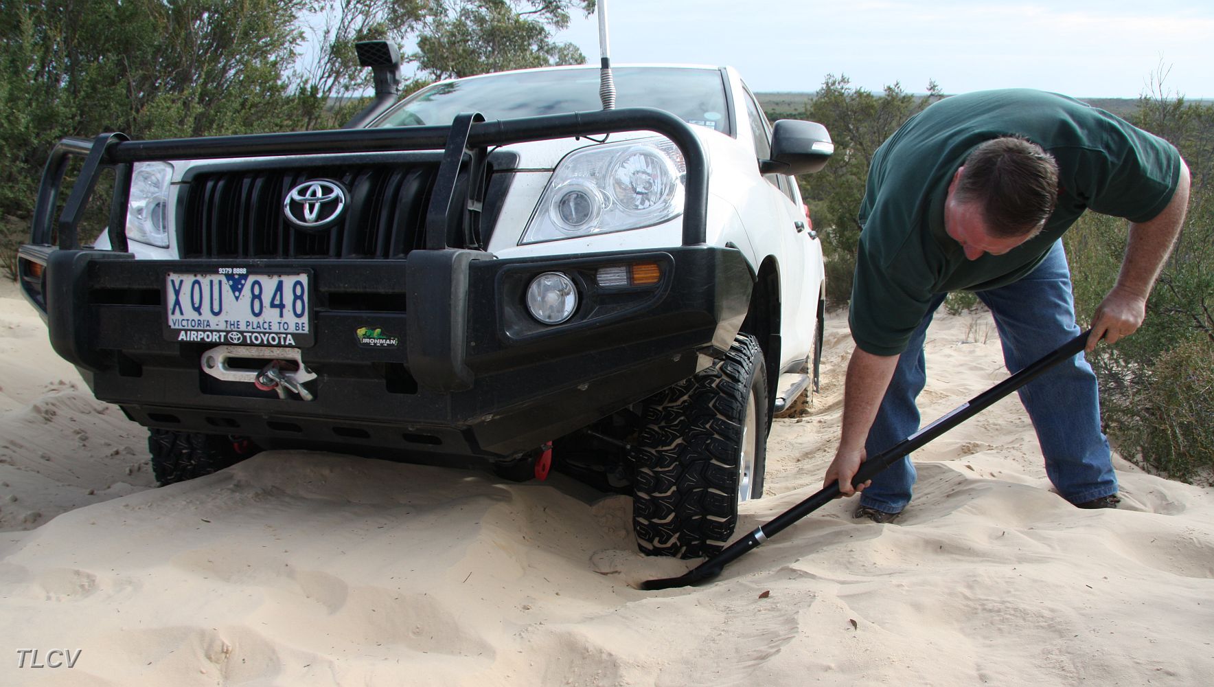 30-Greg tries to dig out Coota on the final sand dune of the Border Track.JPG